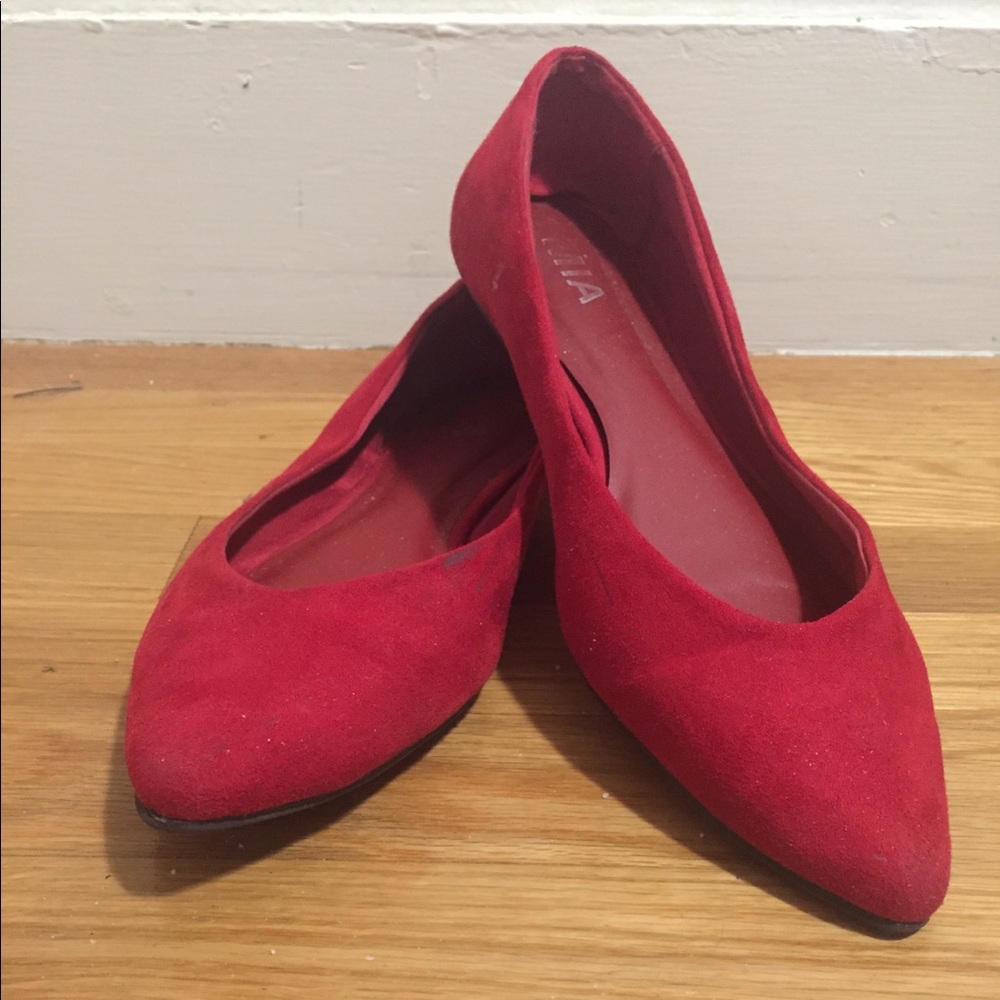 Bright red pointed toe flats